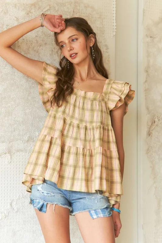 ADORA Ruffled Square Neck Cap Sleeve Babydoll Blouse - Premium Tops from Trendsi - Just $38.80! Shop now at Handbags Specialist Headquarter