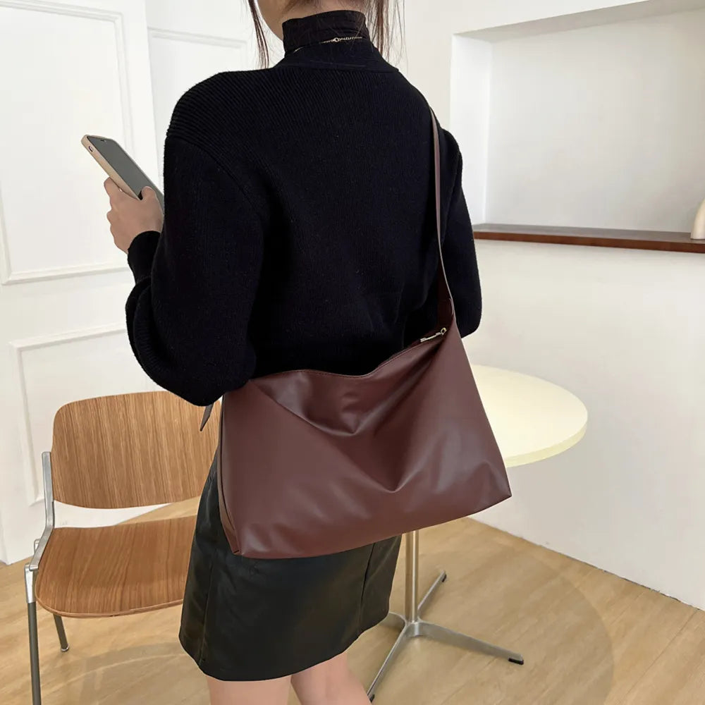 Adjustable Strap PU Leather Handbag - Premium Tote Bag from Trendsi - Just $39.99! Shop now at Handbags Specialist Headquarter