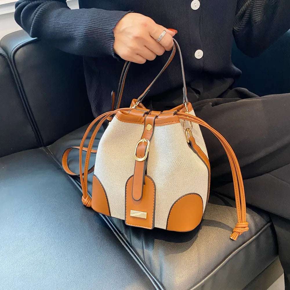 Straw Braided Adjustable Strap Crossbody Bag - Premium Crossbody Bag from Trendsi - Just $38.99! Shop now at Handbags Specialist Headquarter