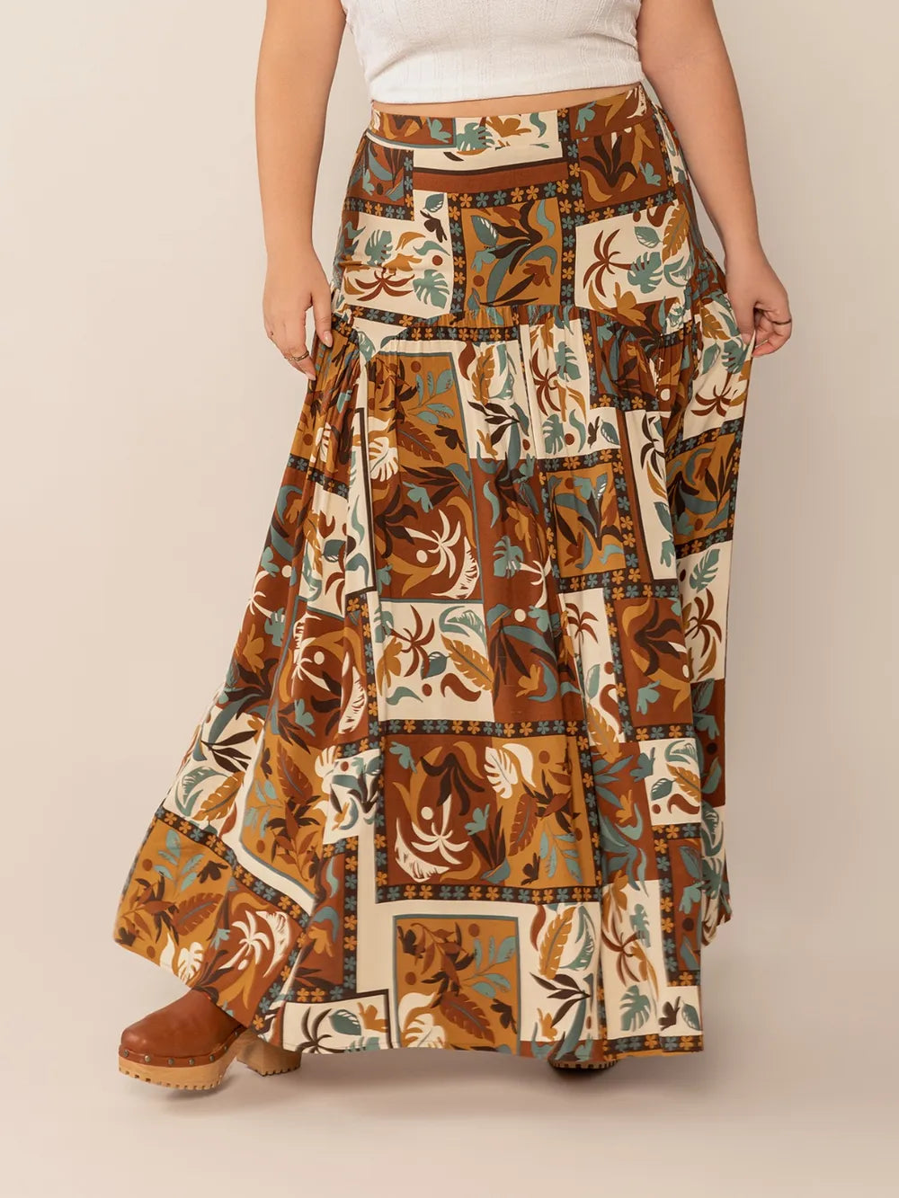 Plus Size Ruched Printed Maxi Skirt - Premium from Trendsi - Just $38.99! Shop now at Handbags Specialist Headquarter