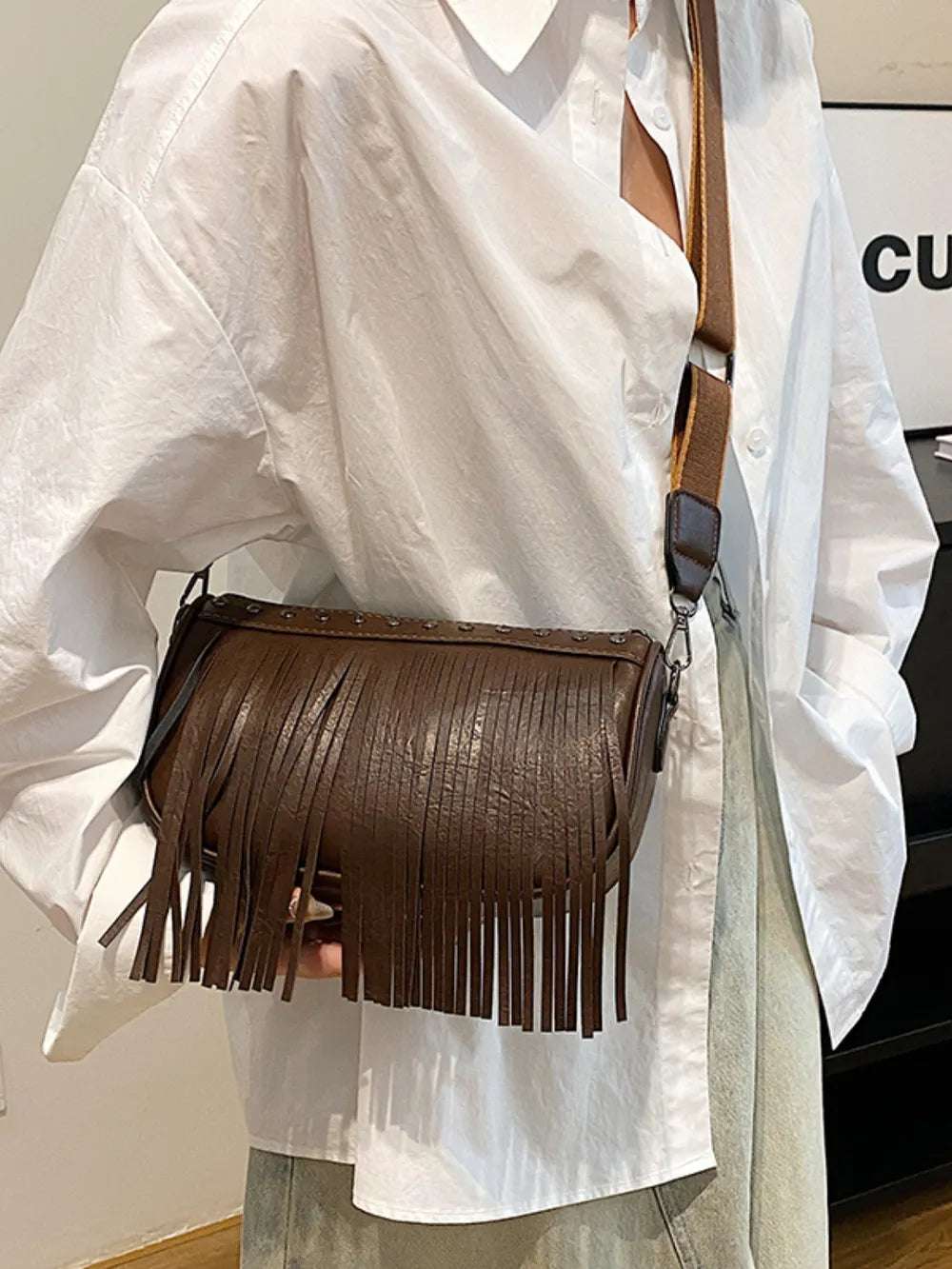 PU Leather Fringe Studded Crossbody Bag - Premium Crossbody Bag from Trendsi - Just $29.99! Shop now at Handbags Specialist Headquarter