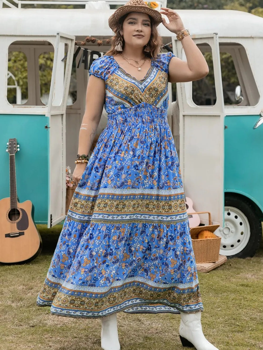 Plus Size Smocked Printed Cap Sleeve Dress - Premium Dresses from Trendsi - Just $38.99! Shop now at Handbags Specialist Headquarter