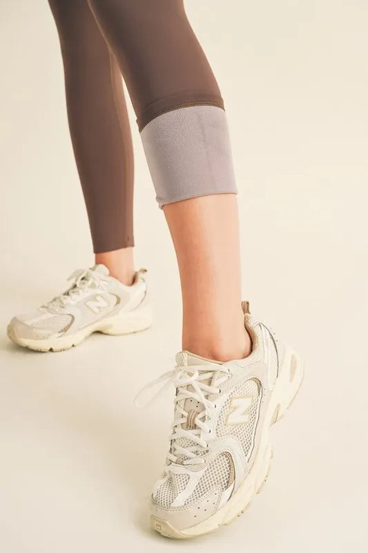 Yelete Full Size Fleece Lined High Waisted Leggings - Premium Leggings from Trendsi - Just $60.54! Shop now at Handbags Specialist Headquarter