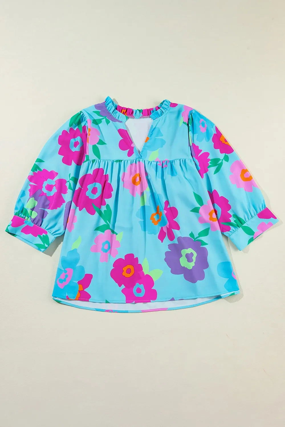 Plus Size Peplum Printed Notched Blouse - Premium Plus Size Shirts from Trendsi - Just $28.66! Shop now at Handbags Specialist Headquarter
