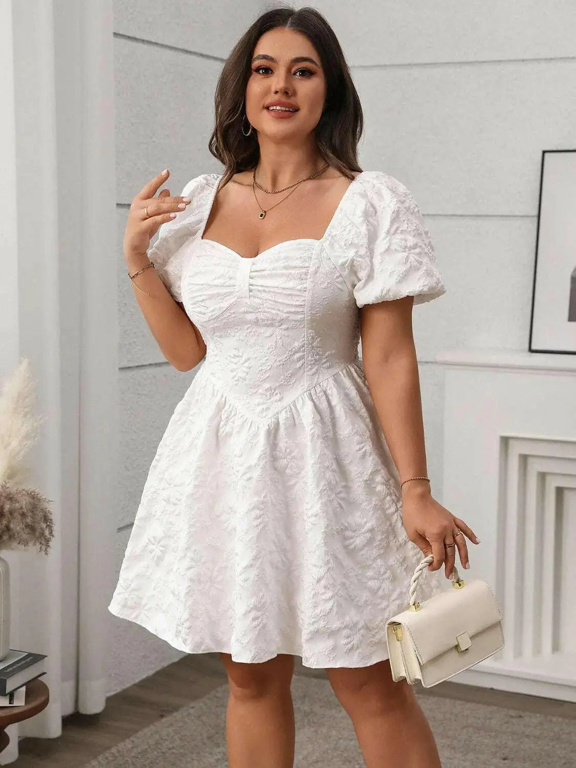 Plus Size Smocked Sweetheart Neck Puff Sleeve Mini Dress.