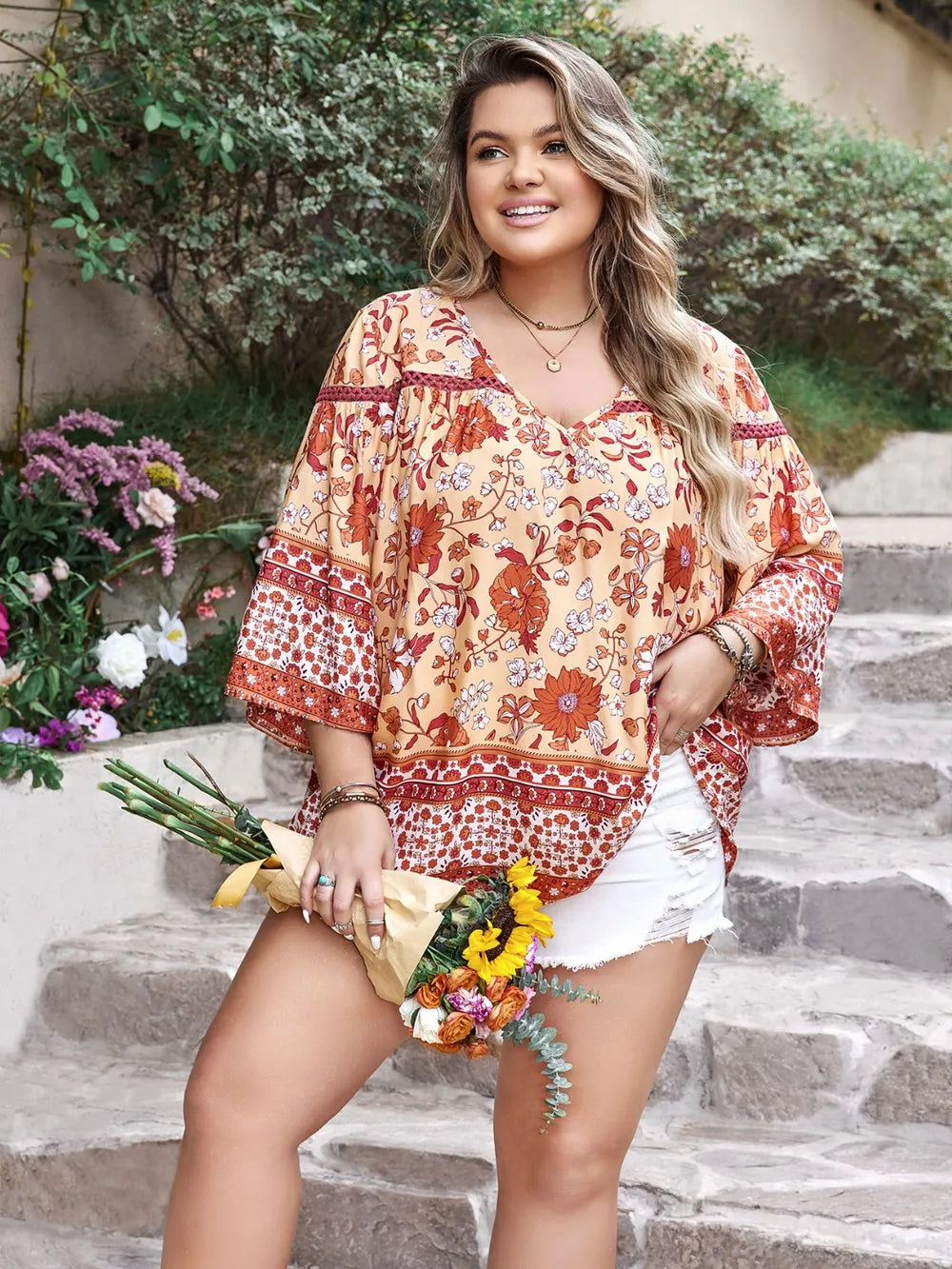 Plus Size Printed V-Neck Three-Quarter Sleeve Blouse - Premium Plus Size Shirts from Trendsi - Just $26! Shop now at Handbags Specialist Headquarter