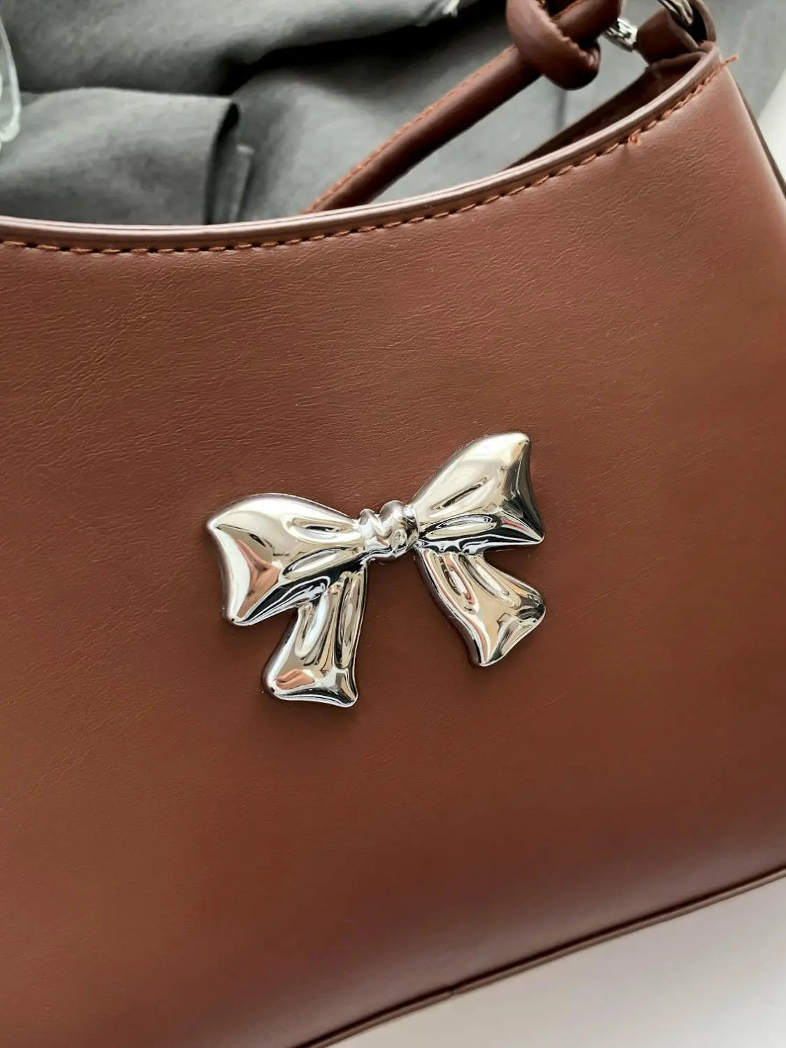 Bow PU Leather Knotted Strap Handbag.
