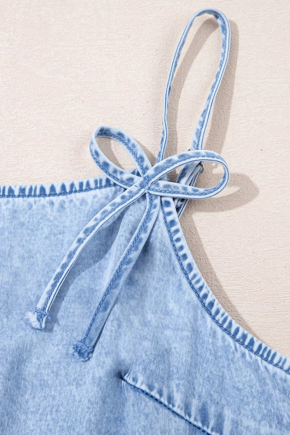 Bow Detail Spaghetti Straps Ruffle Hem Denim Dress - Premium Women / Jeans & Denim from Trendsi - Just $46.38! Shop now at Handbags Specialist Headquarter