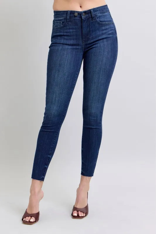 Judy Blue Full Size Mid Rise Skinny Jeans with Raw Hem Plus Size - Premium Women / Jeans & Denim from Trendsi - Just $55.99! Shop now at Handbags Specialist Headquarter