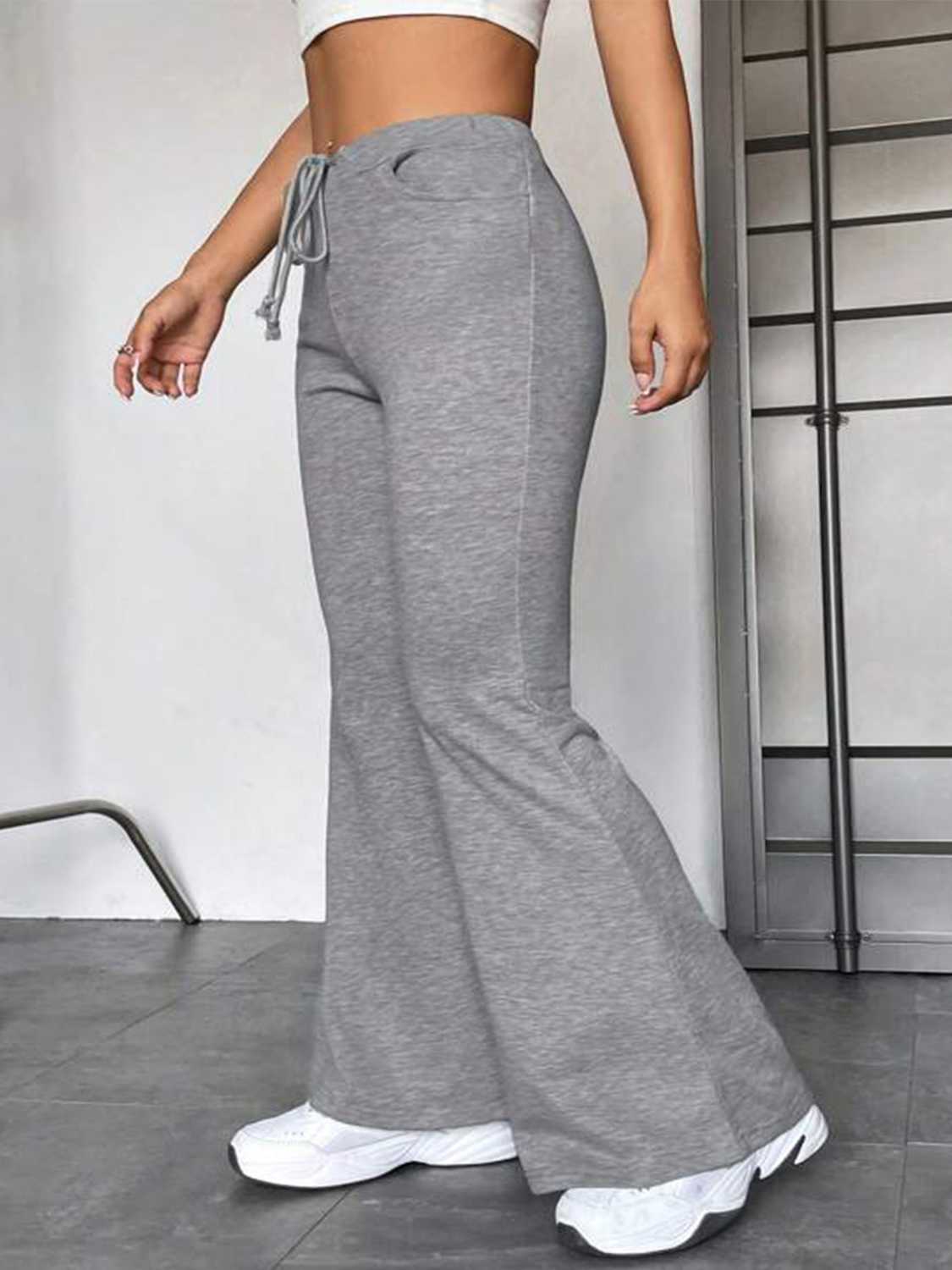 Drawstring Sweatpants with Pockets - Premium  from Trendsi - Just $47.99! Shop now at Handbags Specialist Headquarter