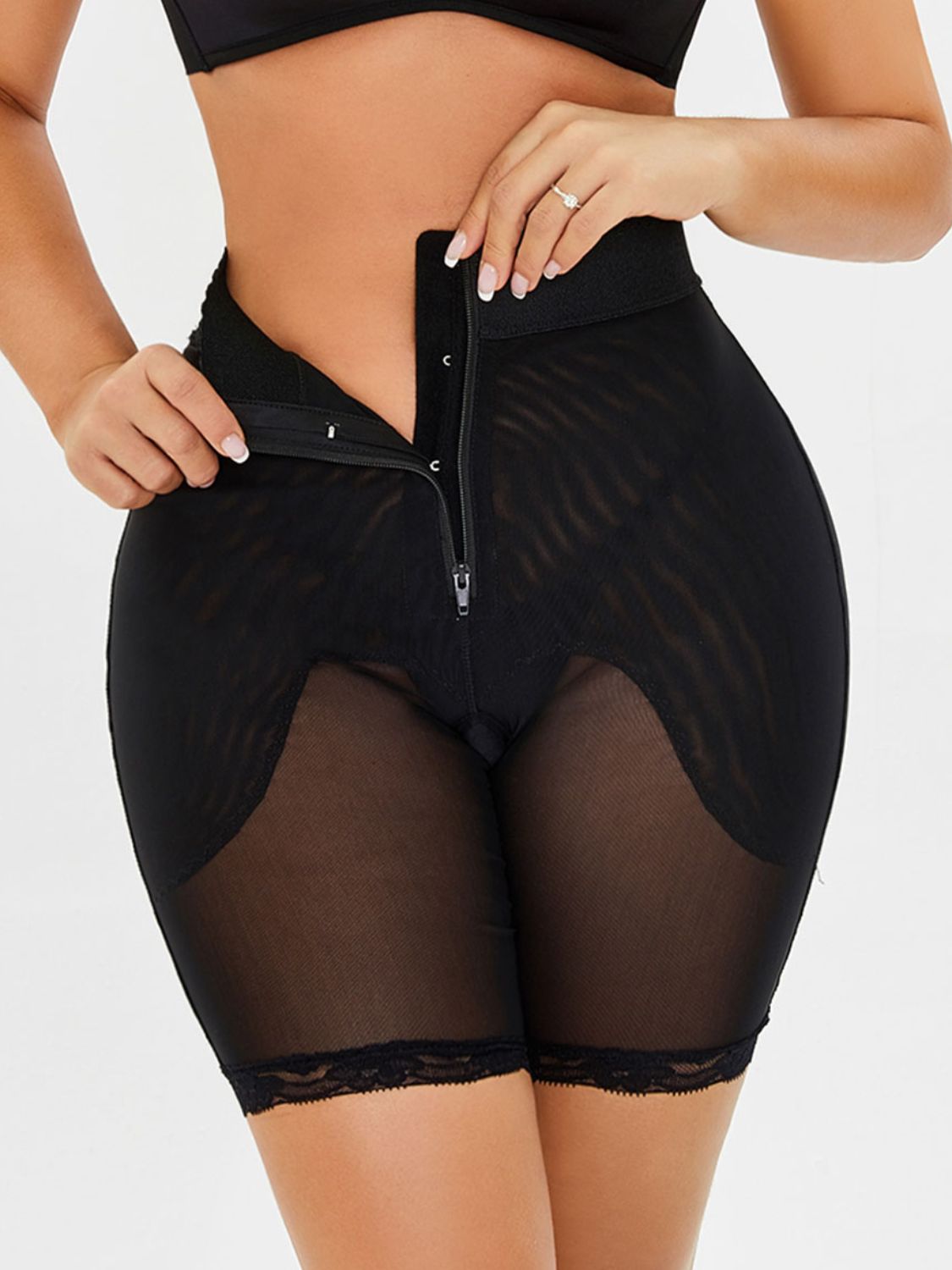 Full Size High-Waisted Lace Trim Shaping Shorts - Premium Bottoms from Trendsi - Just $27! Shop now at Handbags Specialist Headquarter