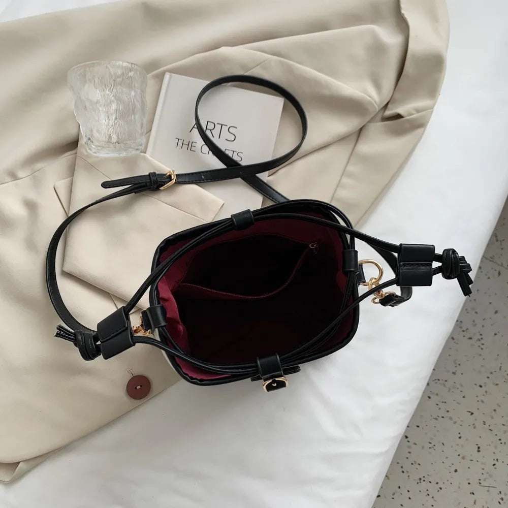 Straw Braided Adjustable Strap Crossbody Bag - Premium Crossbody Bag from Trendsi - Just $38.99! Shop now at Handbags Specialist Headquarter