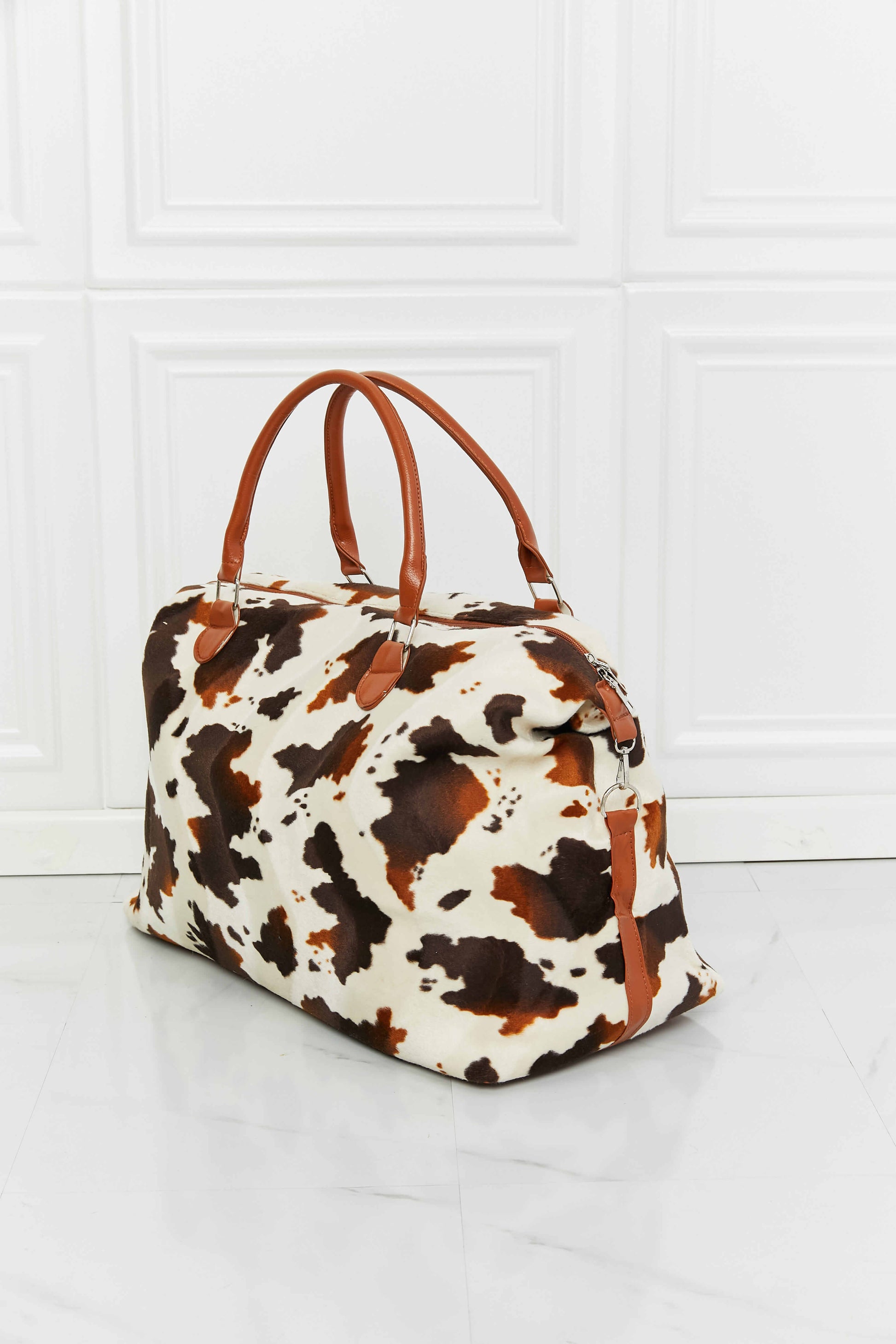 Animal Print Plush Weekender Bag - Premium Weekender Bag from Trendsi - Just $54.99! Shop now at Handbags Specialist Headquarter