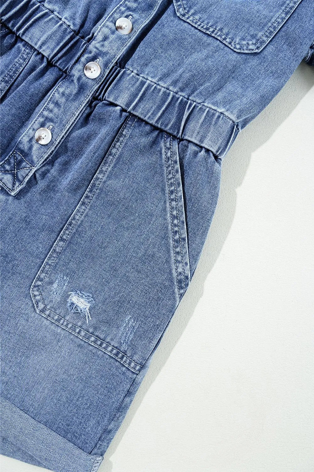 Chest Pocket Front Buttoned Folded Edge Denim Short Sleeve Romper - Premium Women / Jeans & Denim from Trendsi - Just $62.04! Shop now at Handbags Specialist Headquarter