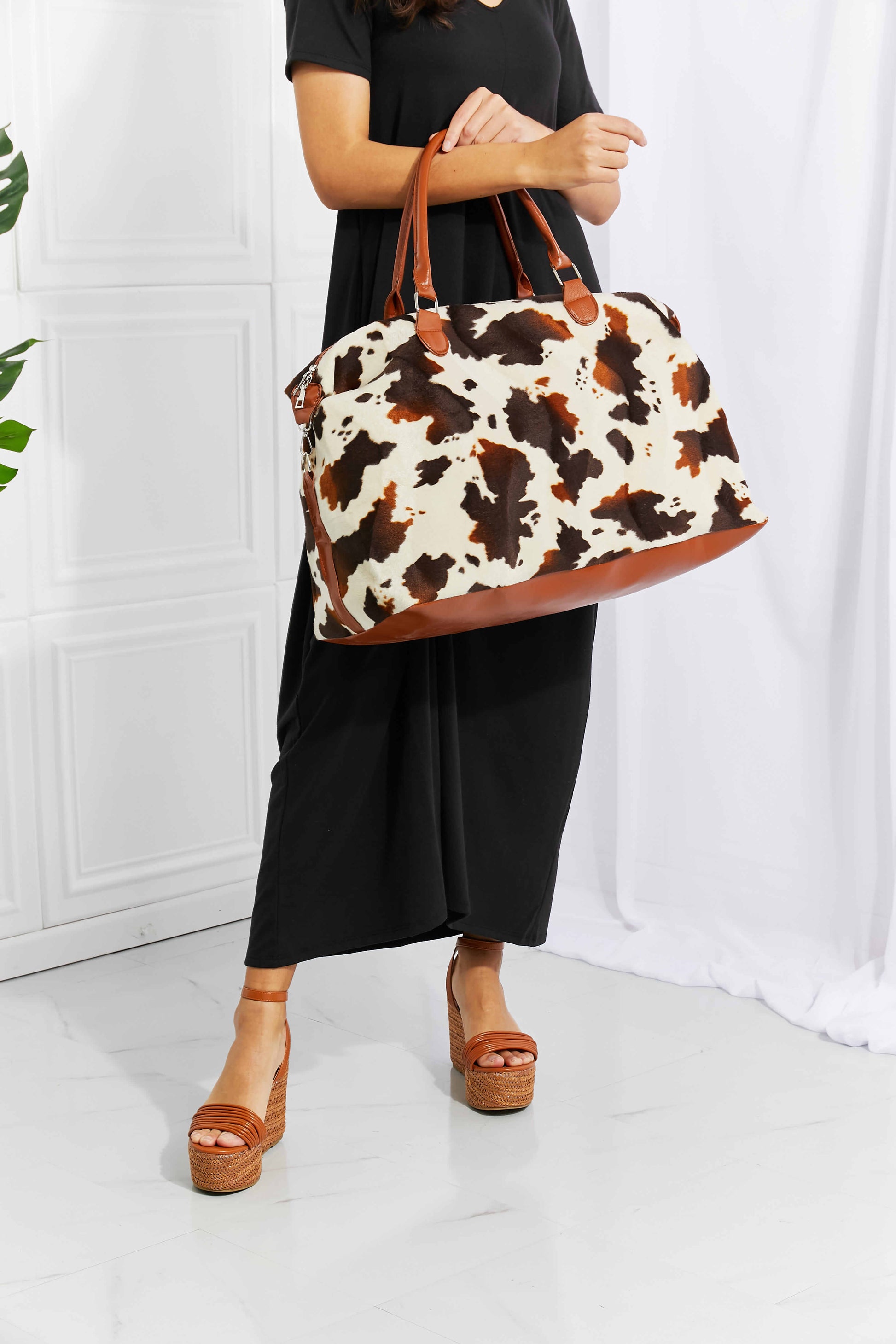 Animal Print Plush Weekender Bag - Premium Weekender Bag from Trendsi - Just $54.99! Shop now at Handbags Specialist Headquarter