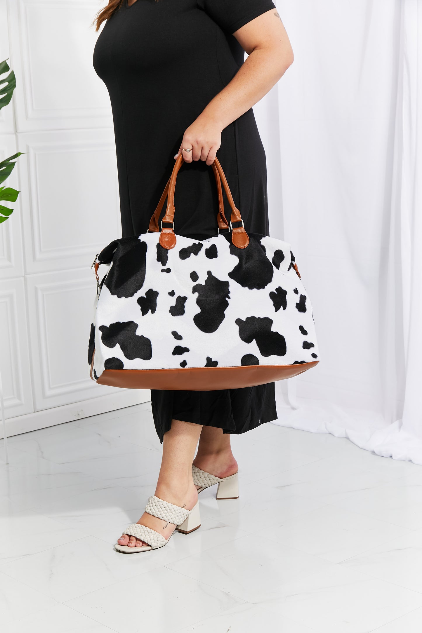 Animal Print Plush Weekender Bag - Premium Weekender Bag from Trendsi - Just $54.99! Shop now at Handbags Specialist Headquarter