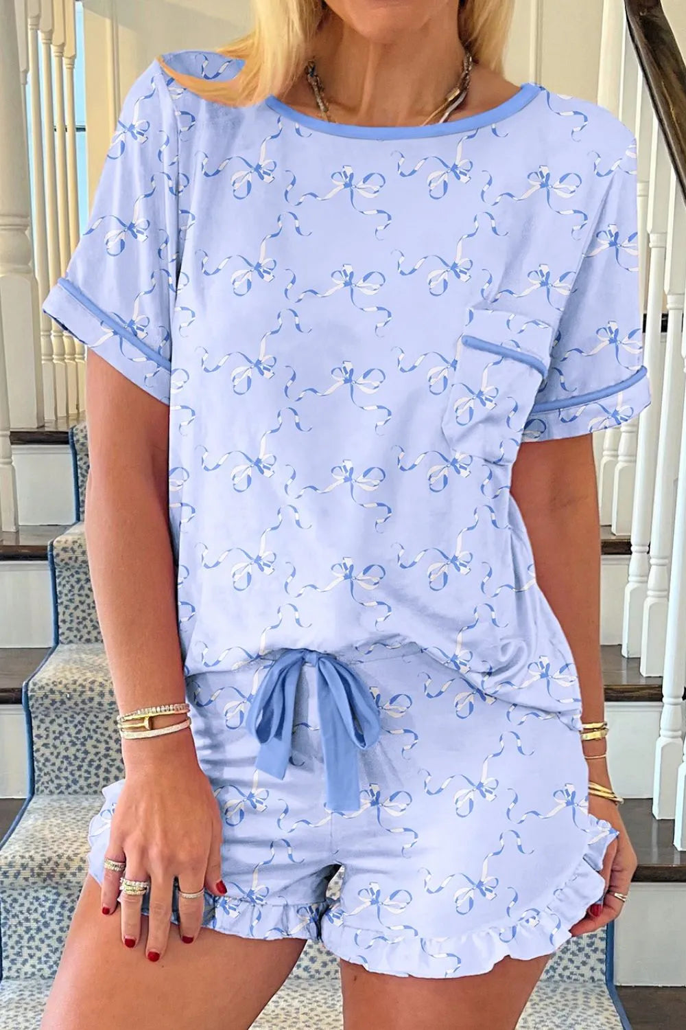 Bow Print Short Sleeve Top and Shorts Pajama Set - Premium Sleepwear from Trendsi - Just $39.99! Shop now at Handbags Specialist Headquarter