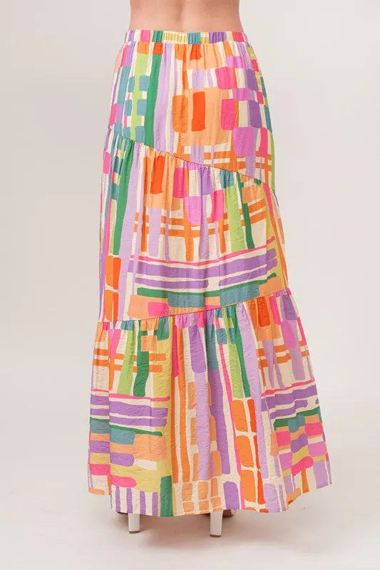 And The Why Asymmetric Geo Printed Tiered Maxi Skirt - Premium Skirts from Trendsi - Just $47.99! Shop now at Handbags Specialist Headquarter