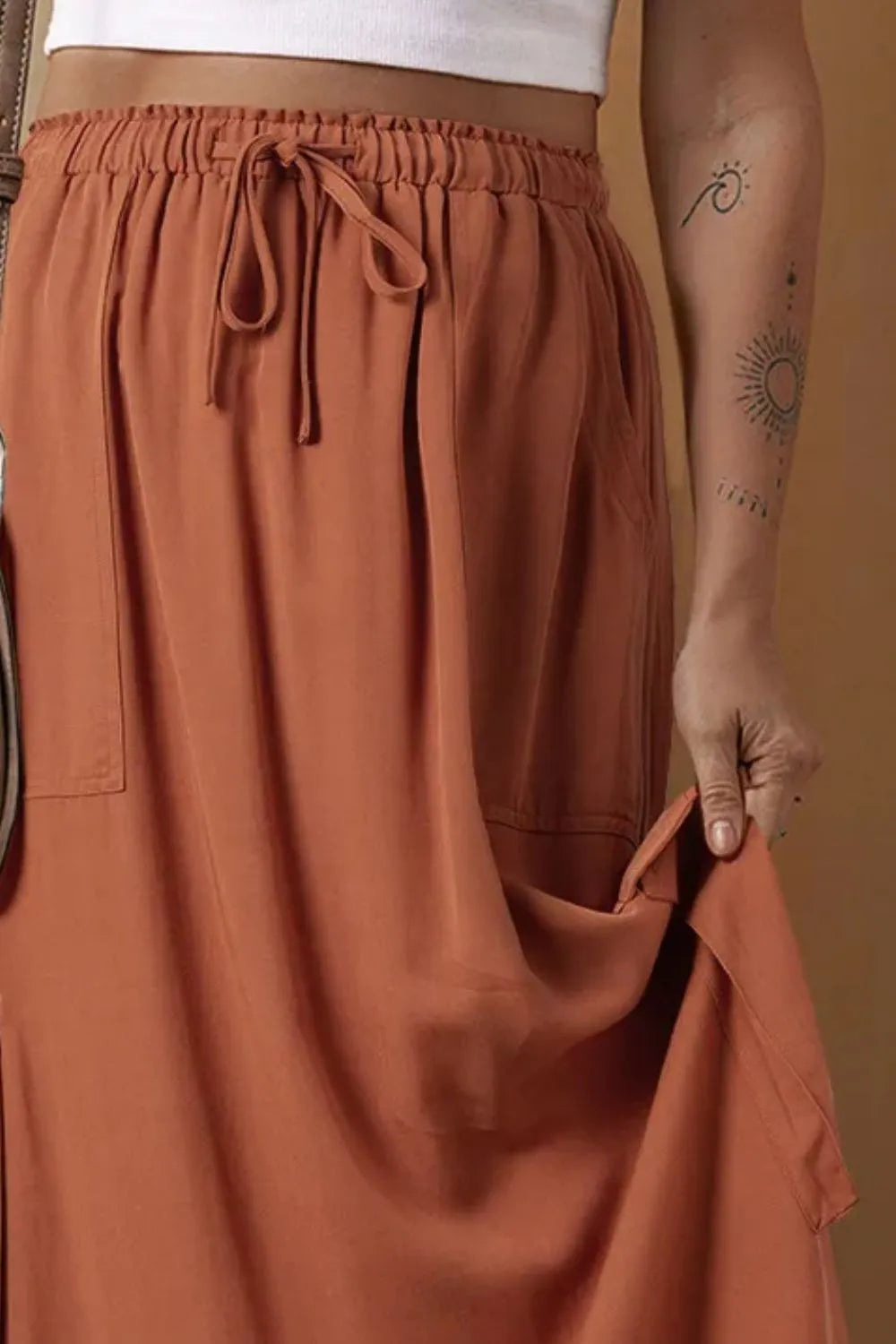 Drawstring Maxi Skirt with Pockets - Premium Skirts from Trendsi - Just $54.99! Shop now at Handbags Specialist Headquarter