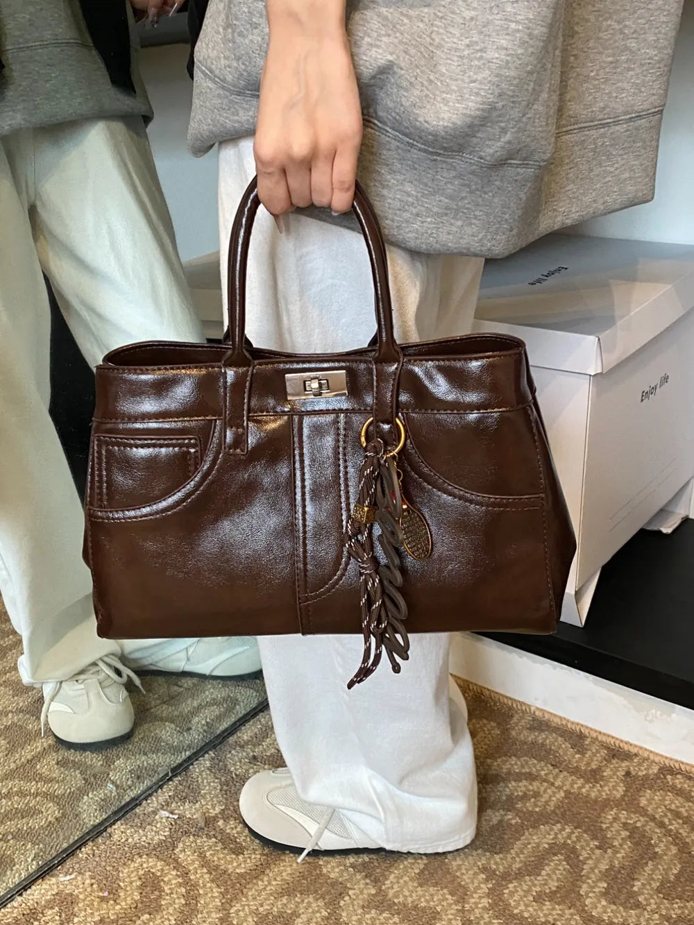 PU Leather Handbag with Pendant - Premium Tote Bag from Trendsi - Just $40.99! Shop now at Handbags Specialist Headquarter