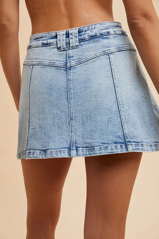 Annie Wear Button Detail Stretch Denim Wrap Mini Skort - Premium Skirts from Trendsi - Just $39.99! Shop now at Handbags Specialist Headquarter