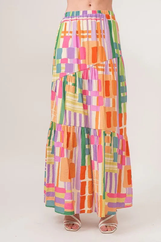 And The Why Asymmetric Geo Printed Tiered Maxi Skirt - Premium Skirts from Trendsi - Just $47.99! Shop now at Handbags Specialist Headquarter
