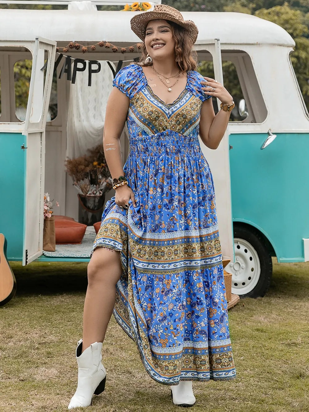 Plus Size Smocked Printed Cap Sleeve Dress - Premium Dresses from Trendsi - Just $38.99! Shop now at Handbags Specialist Headquarter
