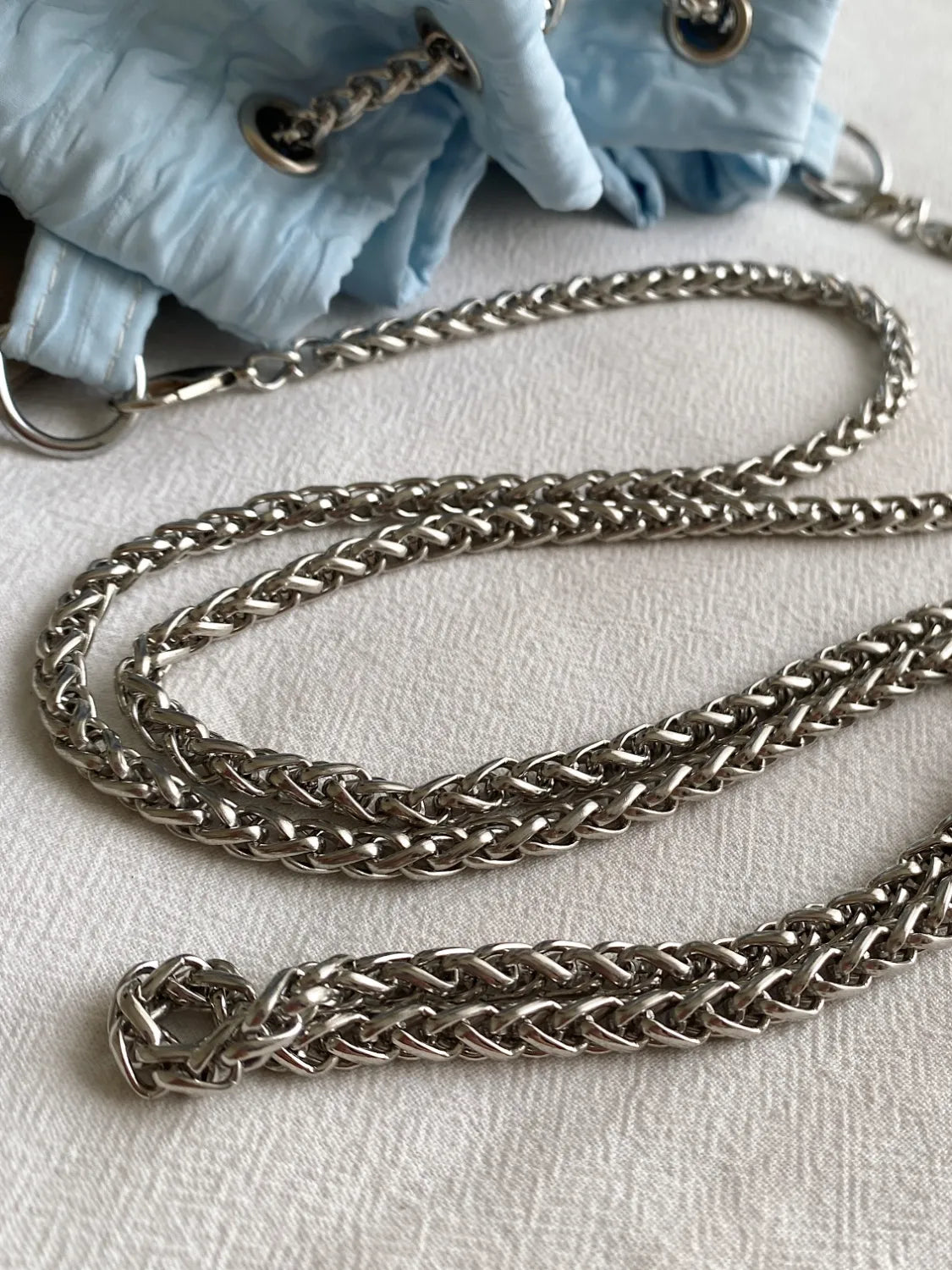Textured Chain Bucket Bag.