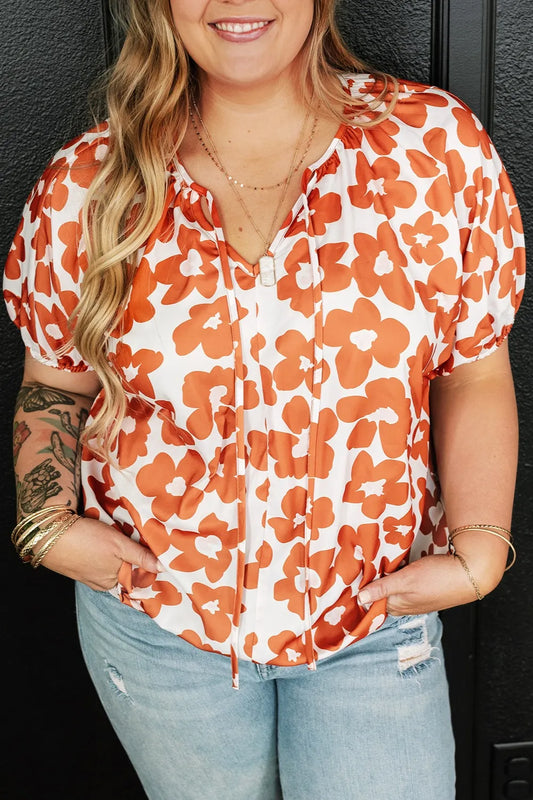 Plus Size Printed Tie Neck Short Sleeve Blouse - Premium Plus Size Shirts from Trendsi - Just $21! Shop now at Handbags Specialist Headquarter