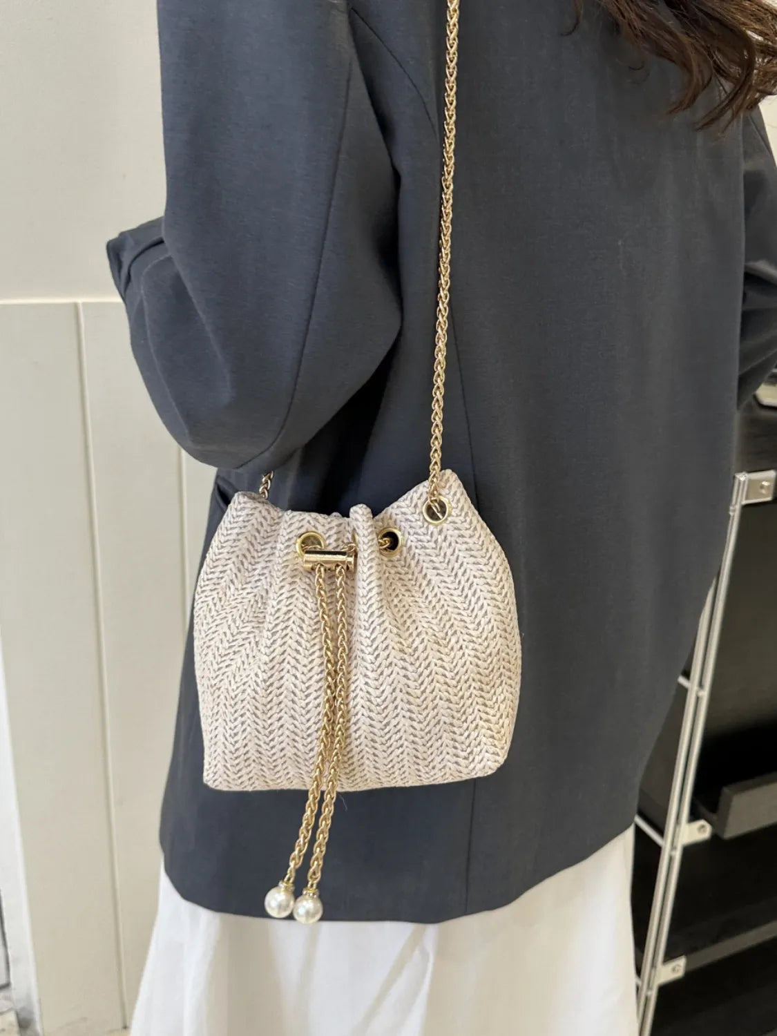 Straw Braided Chain Bucket Bag.