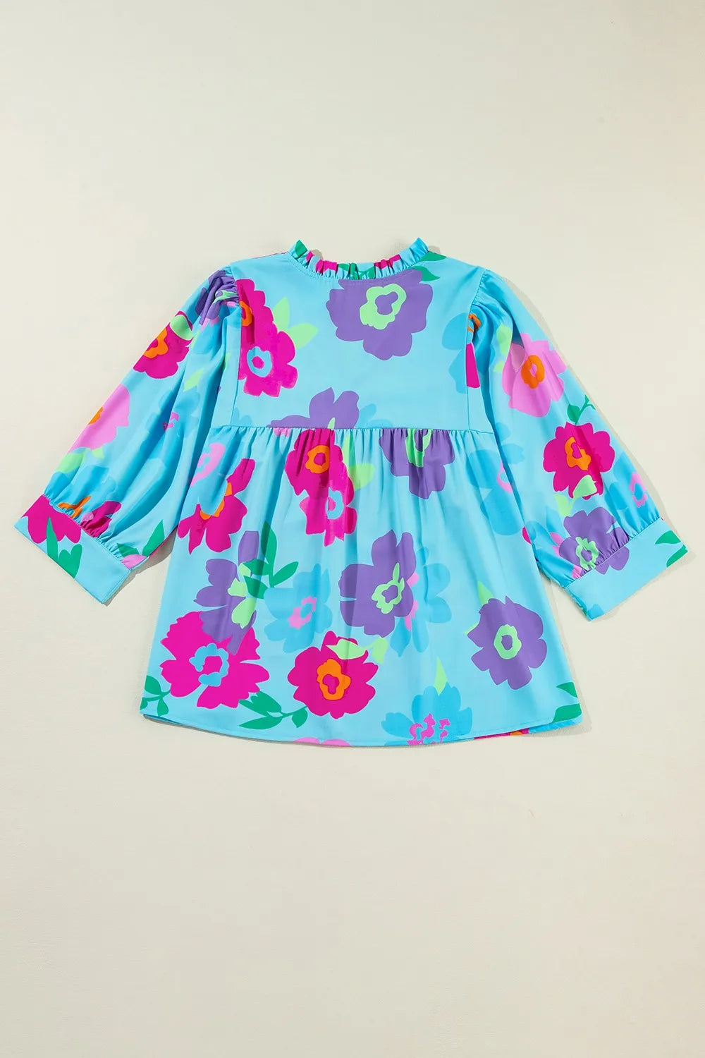 Plus Size Peplum Printed Notched Blouse - Premium Plus Size Shirts from Trendsi - Just $28.66! Shop now at Handbags Specialist Headquarter