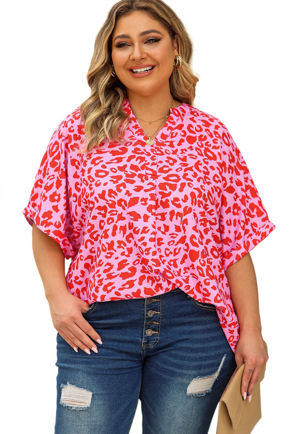 Plus Size Printed Notched Neck Half Sleeve Top - Premium Plus Size Shirts from Trendsi - Just $28! Shop now at Handbags Specialist Headquarter
