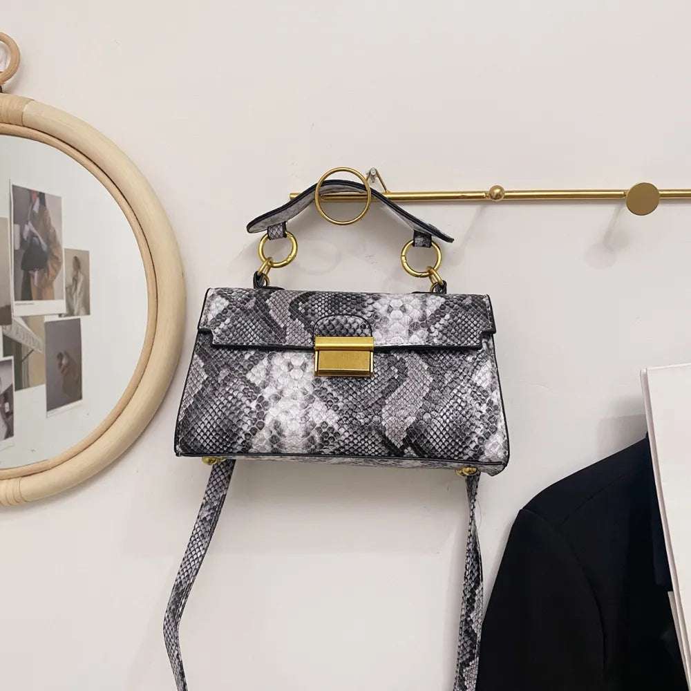 PU Leather Snakeskin Print Crossbody Bag - Premium Crossbody Bag from Trendsi - Just $35.99! Shop now at Handbags Specialist Headquarter