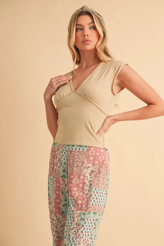 Aemi+Co V-Neck Cap Sleeve Cropped Top - Premium Women / Jeans & Denim from Trendsi - Just $32.64! Shop now at Handbags Specialist Headquarter