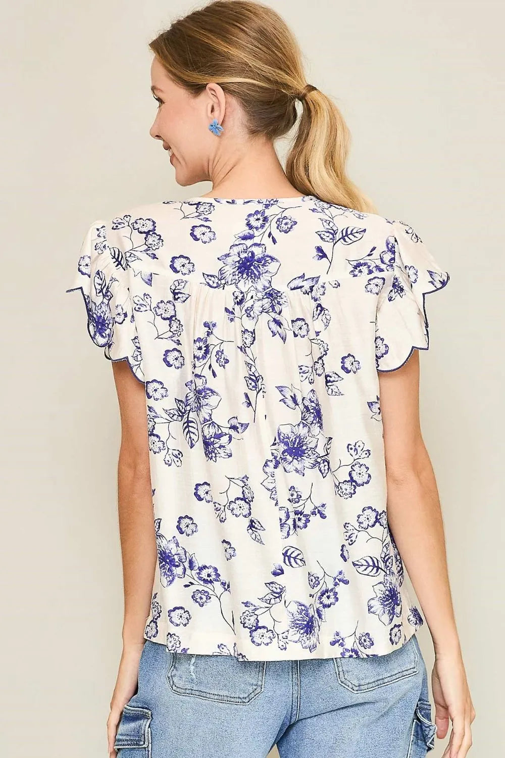 Umgee Full Size Floral Print Tassel Tie Neck Scalloped Sleeve Blouse Plus Size - Premium Dresses from Trendsi - Just $46.99! Shop now at Handbags Specialist Headquarter