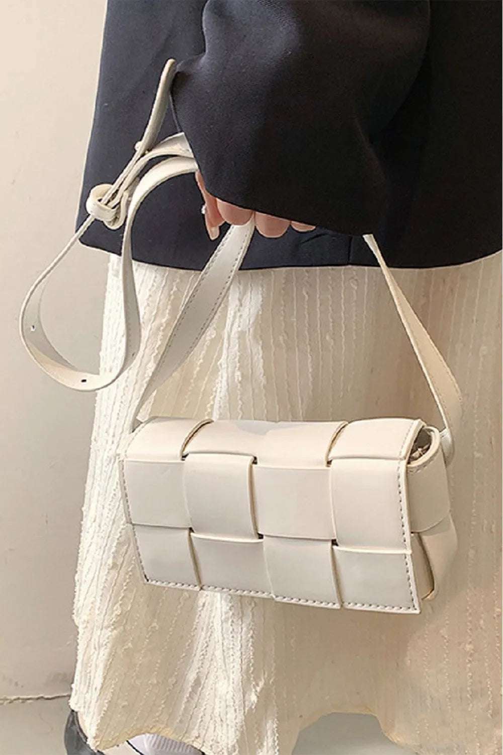Zenana Vegan Leather Woven Crossbody Bag - Premium Crossbody Bag from Trendsi - Just $31.99! Shop now at Handbags Specialist Headquarter