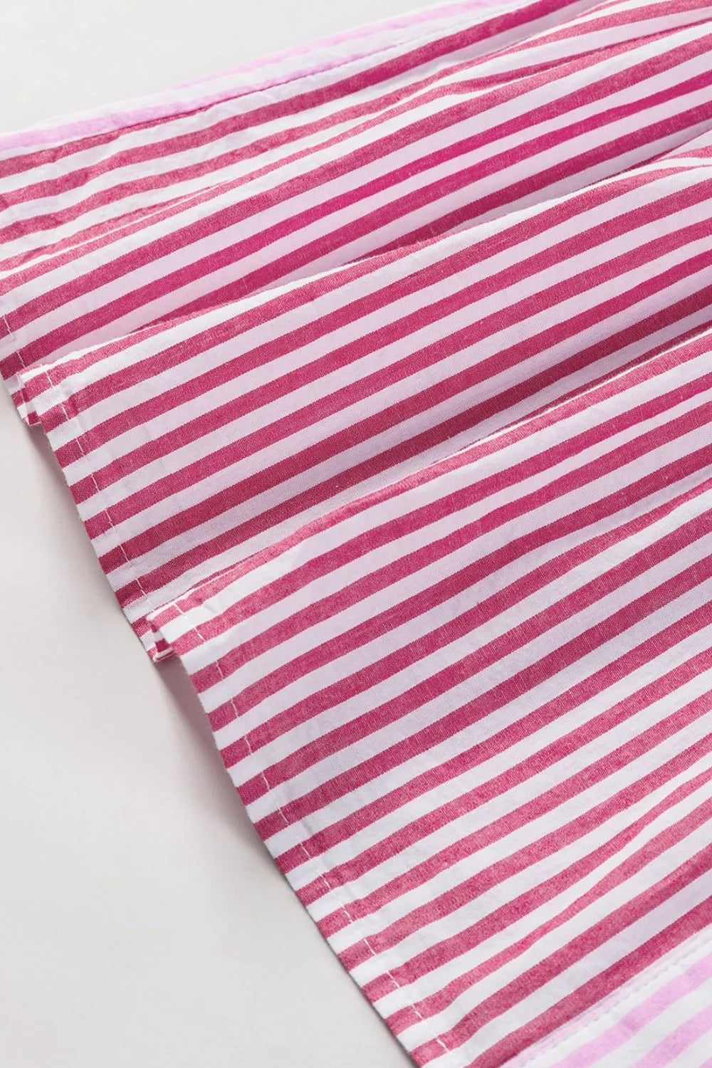 Button Down Striped Ruffled Hem Shirt - Premium Women's Down Shirt Tops from Trendsi - Just $28.46! Shop now at Handbags Specialist Headquarter