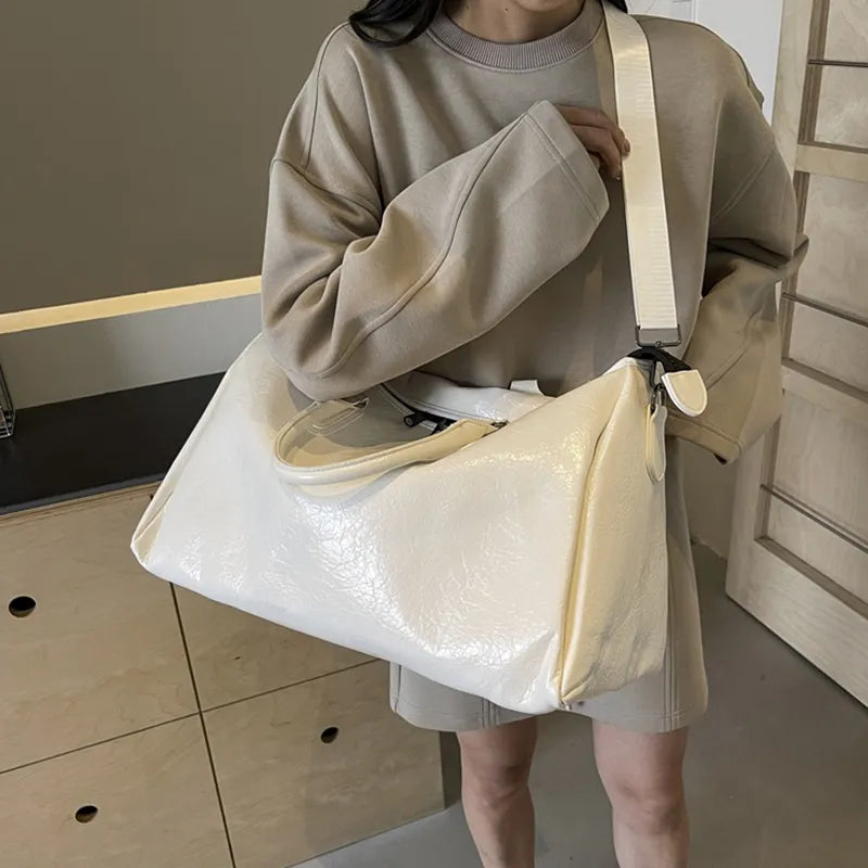 PU Leather Oversize Travel Bag - Premium travel-bag from Trendsi - Just $50.99! Shop now at Handbags Specialist Headquarter