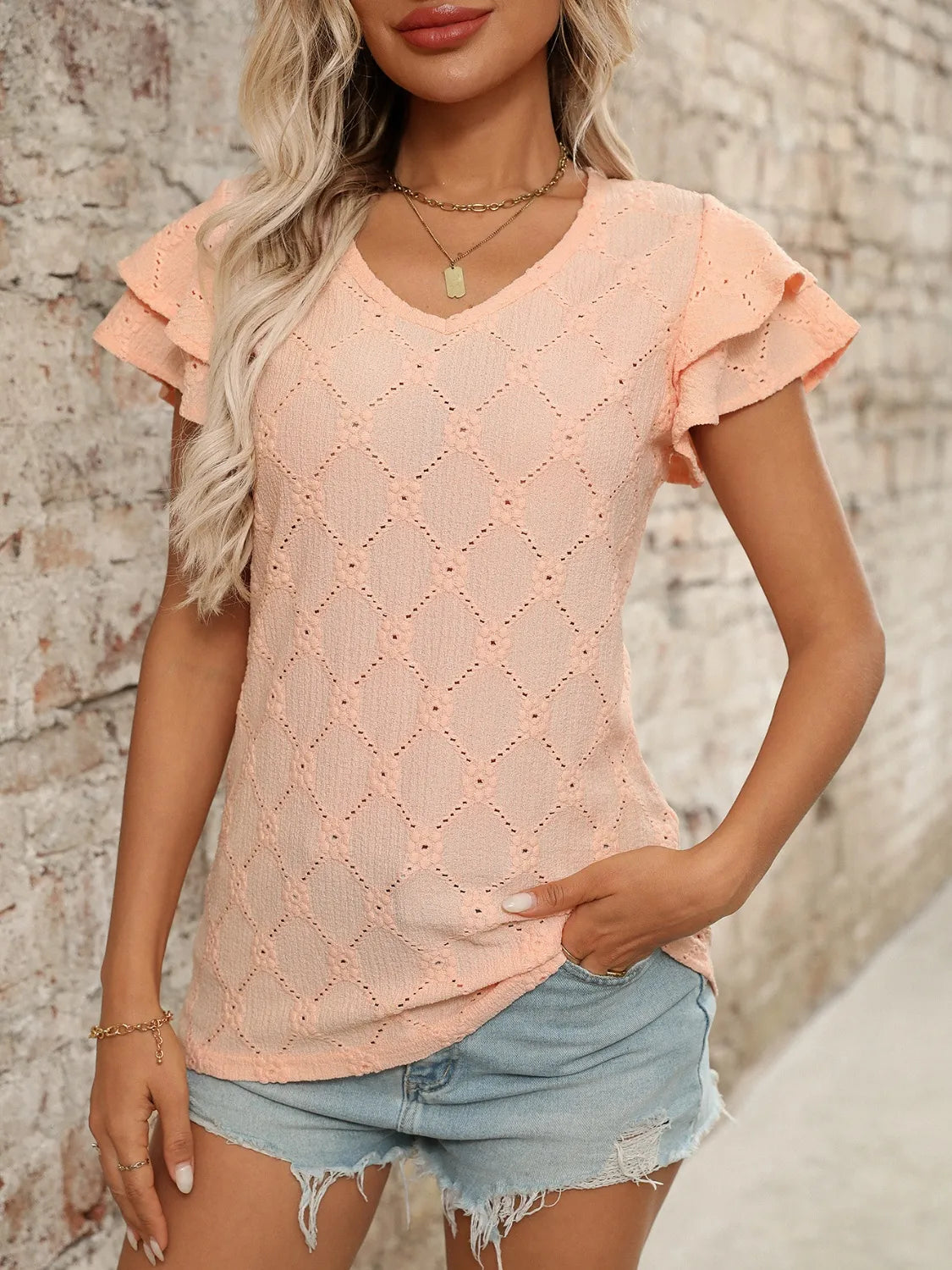 Eyelet V-Neck Ruffled Cap Sleeve Top - Premium Tops from Trendsi - Just $20.68! Shop now at Handbags Specialist Headquarter