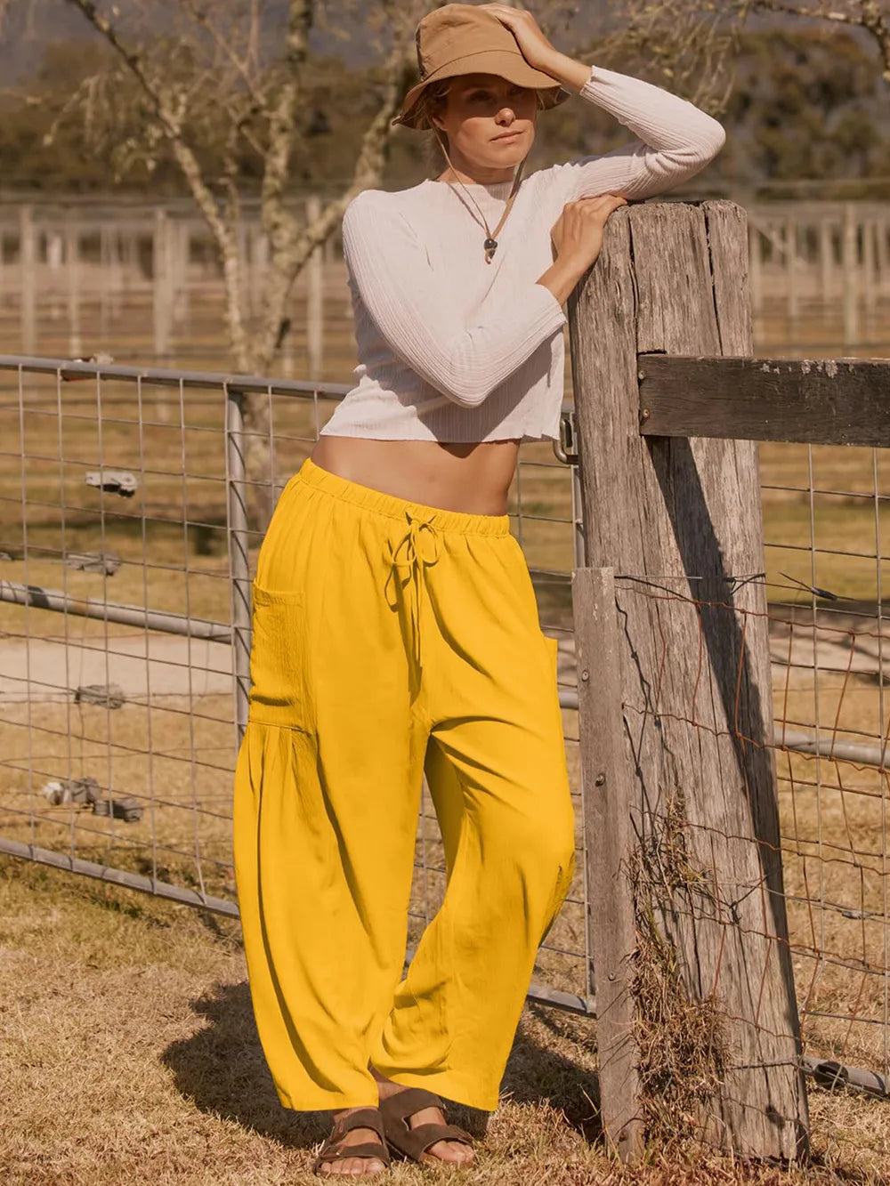 Full Size Wide Leg Pants with Pockets - Premium Women Pants from Trendsi - Just $42.99! Shop now at Handbags Specialist Headquarter