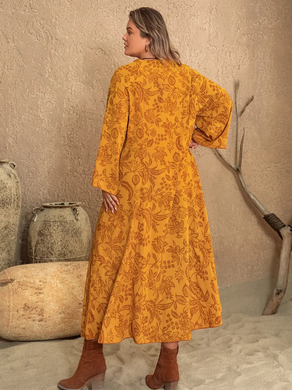 Plus Size Printed Slit Long Sleeve Dress - Premium Dresses from Trendsi - Just $41.99! Shop now at Handbags Specialist Headquarter