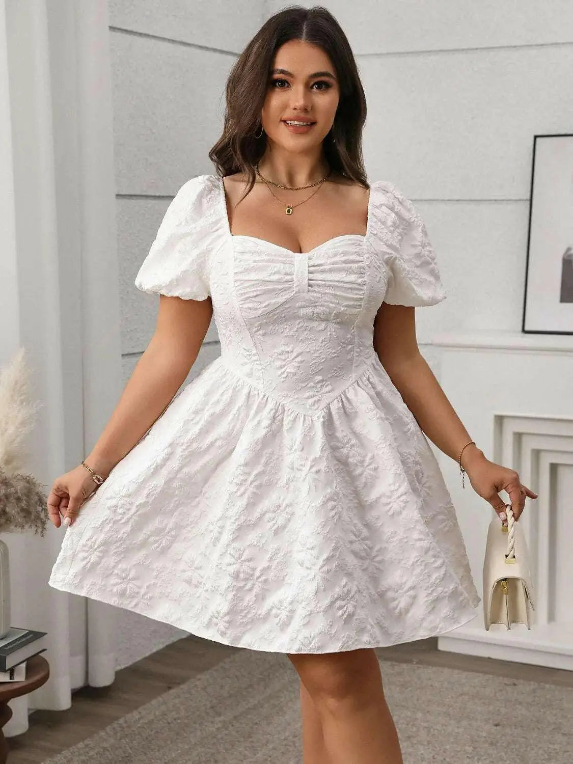 Plus Size Smocked Sweetheart Neck Puff Sleeve Mini Dress.