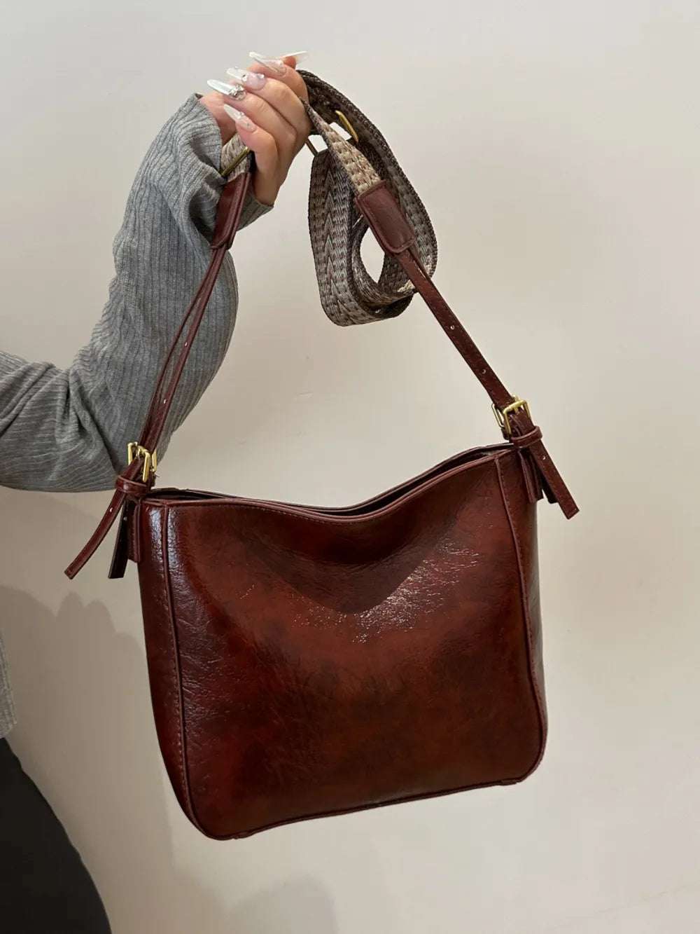 PU Leather Adjustable Strap Crossbody Bag with Pouch - Premium Crossbody Bag from Trendsi - Just $31.99! Shop now at Handbags Specialist Headquarter