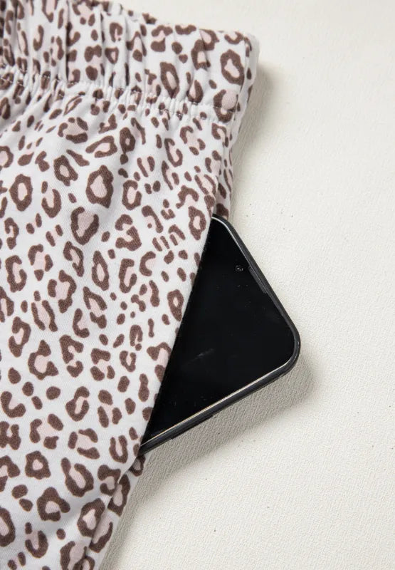 Leopard Button Down Long Sleeve Top and Pants Lounge Set - Premium Sleepwear from Trendsi - Just $49.34! Shop now at Handbags Specialist Headquarter
