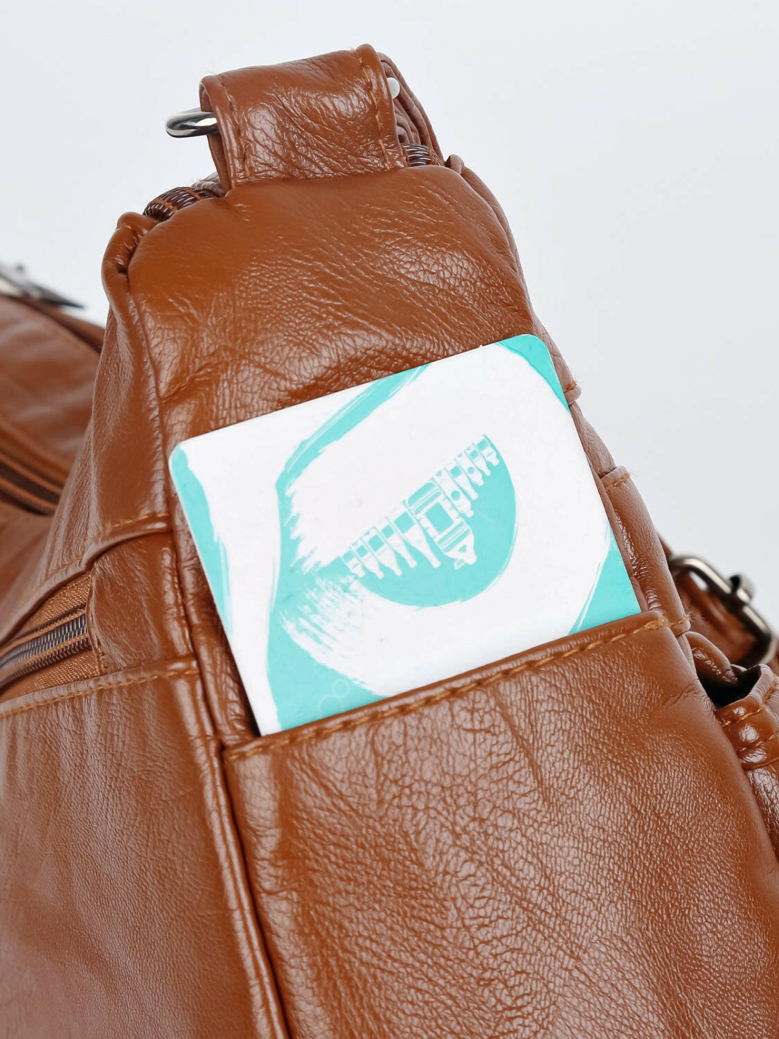 PU Leather Adjustable Strap Shoulder Bag.