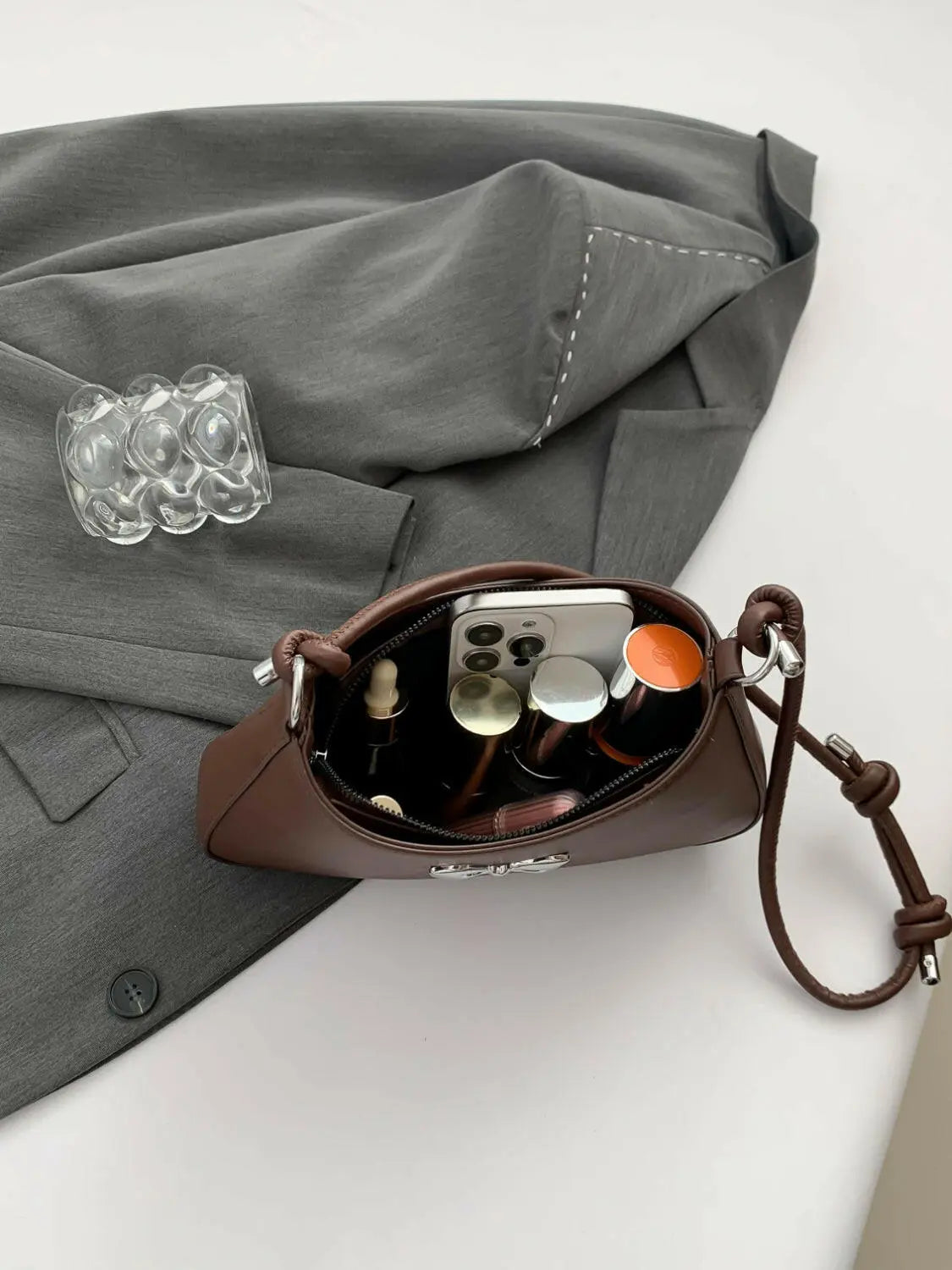 Bow PU Leather Knotted Strap Handbag.