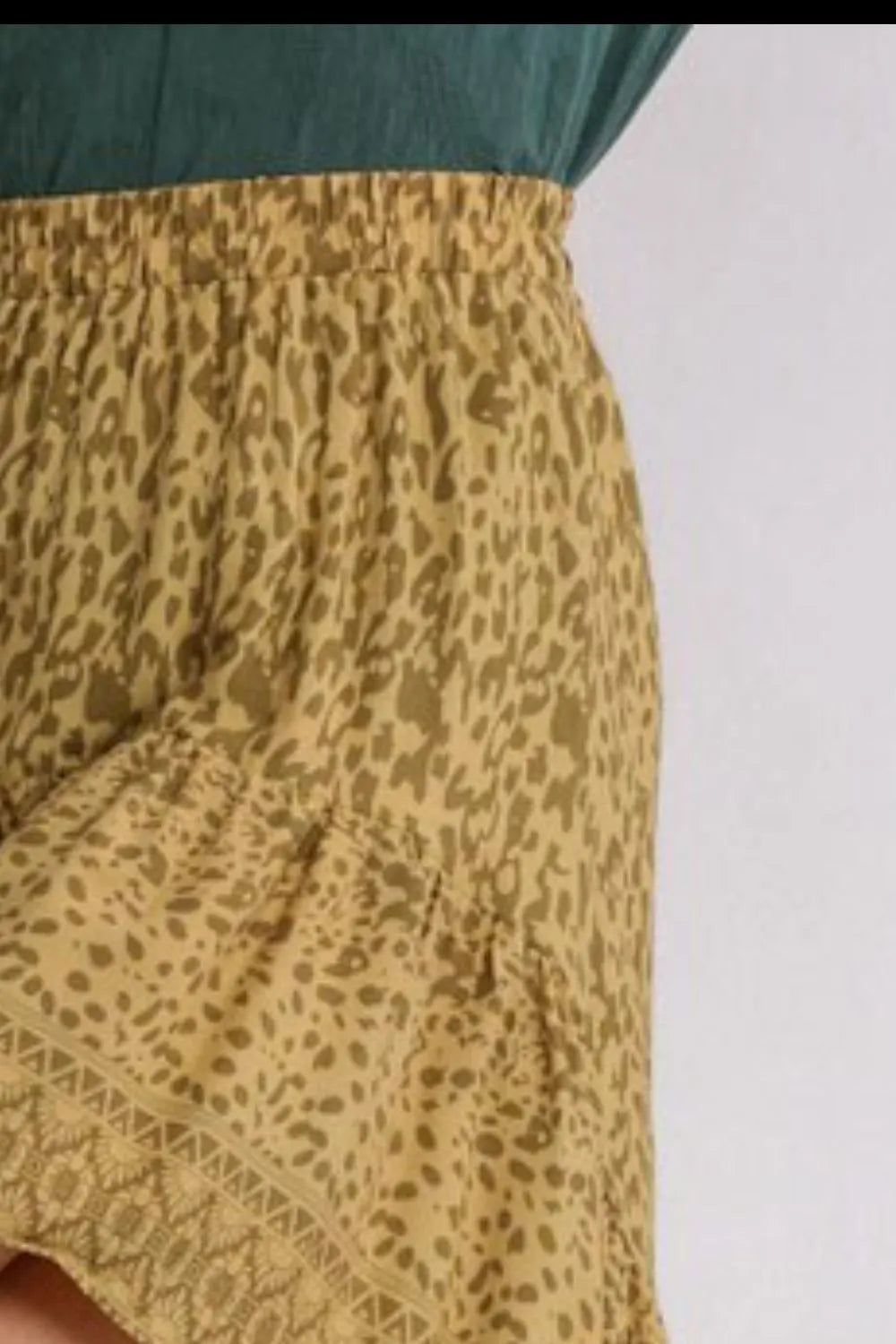 Umgee Full Size Animal Border Print High Low Skirt Plus Size - Premium from Trendsi - Just $36.99! Shop now at Handbags Specialist Headquarter