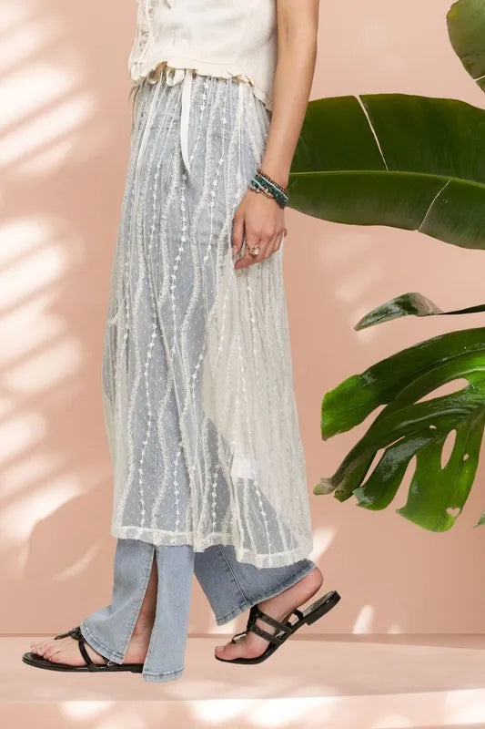 ADORA Sheer Layered Mesh Cover-Up Skirt - Premium Skirts from Trendsi - Just $26.99! Shop now at Handbags Specialist Headquarter