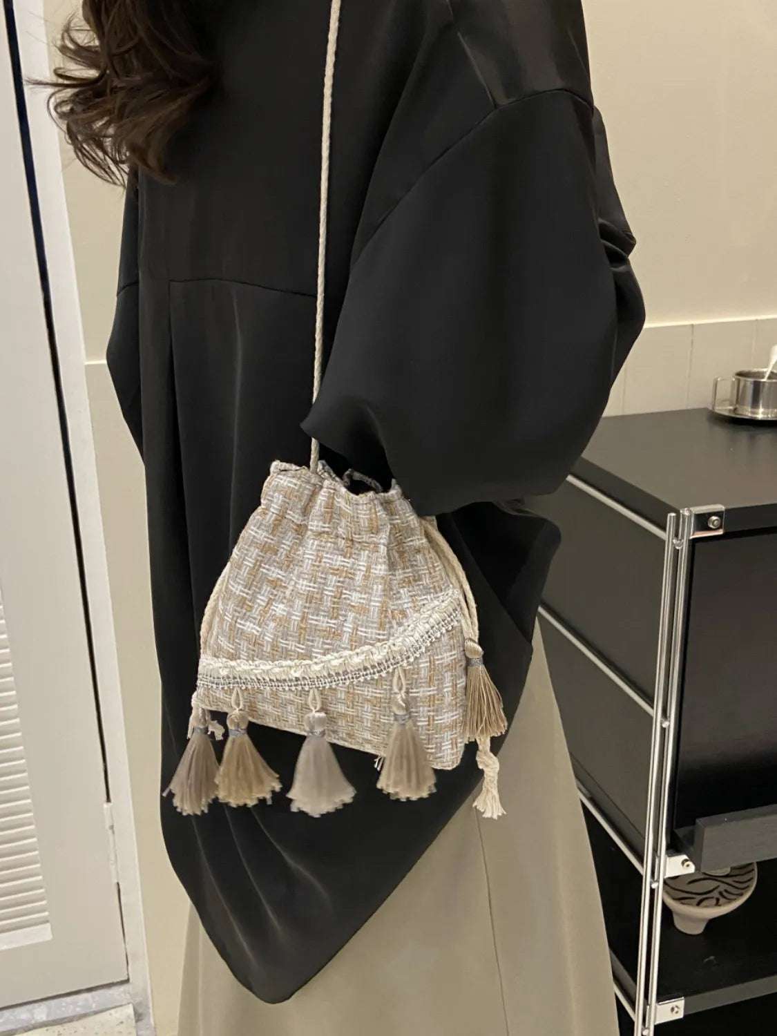 Tassel Trim Woven Bucket Crossbody Bag - Premium Crossbody Bag from Trendsi - Just $14.99! Shop now at Handbags Specialist Headquarter