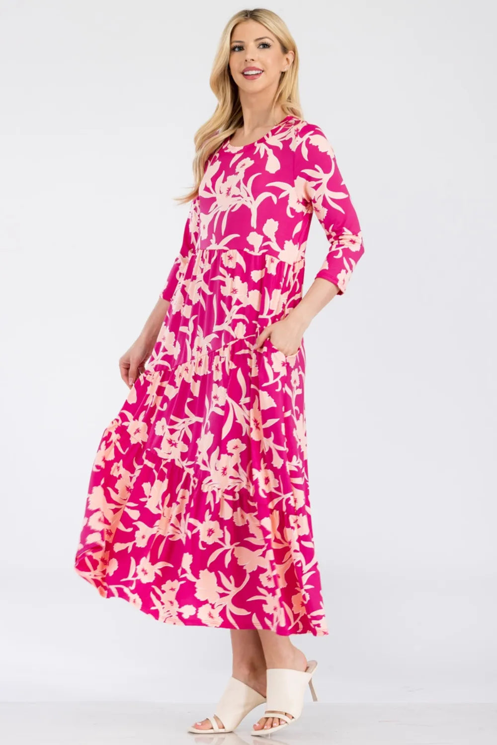 Celeste Full Size Floral Round Neck Ruffle Hem Dress - Premium Dresses from Trendsi - Just $50.99! Shop now at Handbags Specialist Headquarter